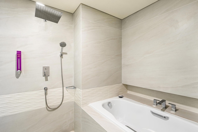 Imagen de la habitación del Hotel Quest Hotel Prime Pemuda - Semarang. Foto 14