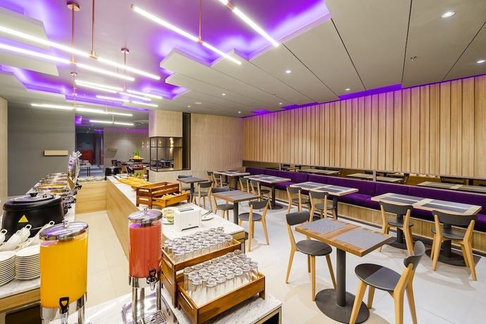 Imagen del bar/restaurante del Hotel Quest Hotel Prime Pemuda - Semarang. Foto 3