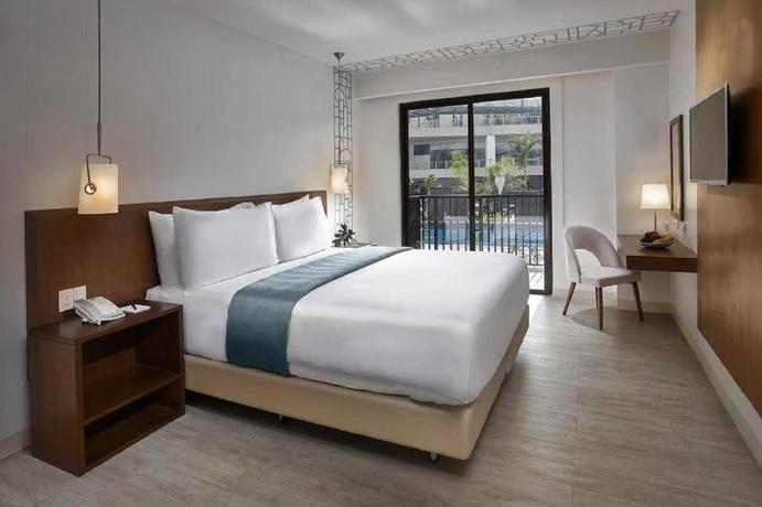 Imagen de la habitación del Hotel Quest Hotel Tagaytay. Foto 11