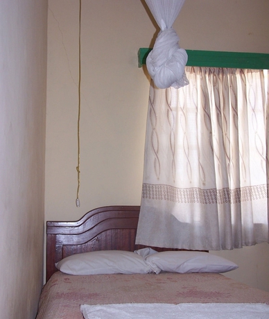 Imagen de la habitación del Hotel Quest Resort. Foto 9
