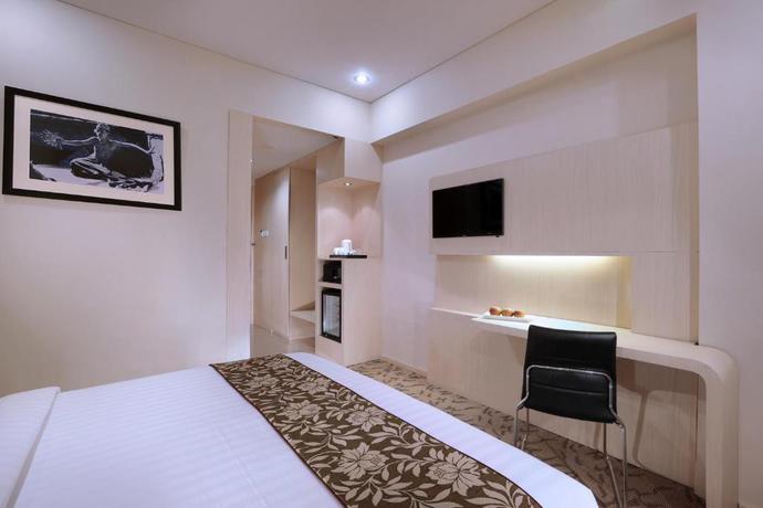 Imagen de la habitación del Hotel Quest San Denpasar By Aston - Chse Certified. Foto 6