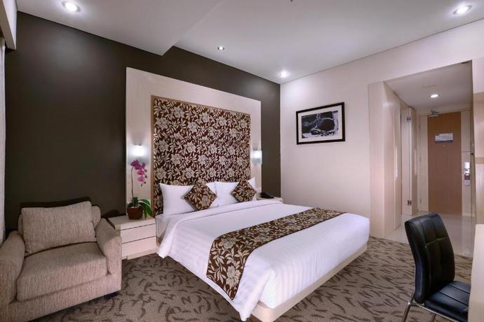 Imagen de la habitación del Hotel Quest San Denpasar By Aston - Chse Certified. Foto 7