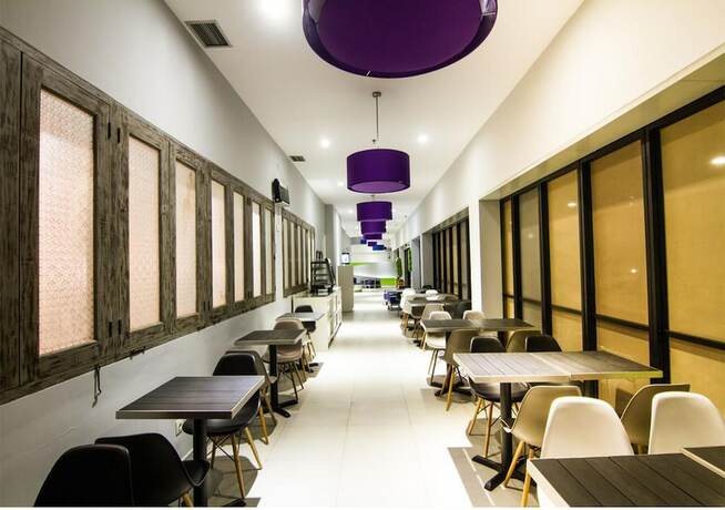 Imagen del bar/restaurante del Hotel Quest Vibe Dewi Sri Bali. Foto 2