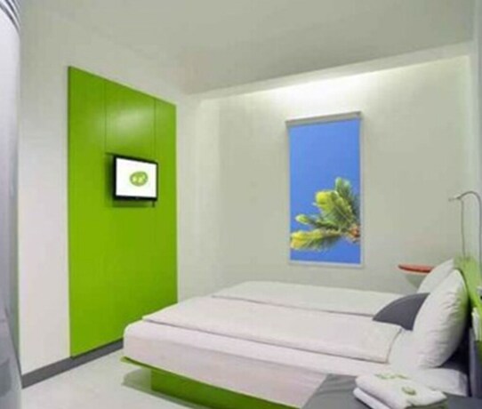 Imagen de la habitación del Hotel Quest Vibe Dewi Sri Bali. Foto 6