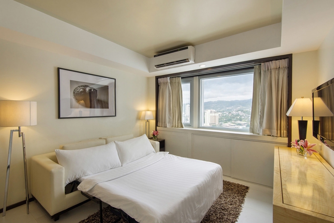 Imagen de la habitación del Hotel Quest and Conference Center. Foto 6