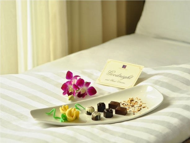 Imagen de la habitación del Hotel Quest and Conference Center. Foto 9