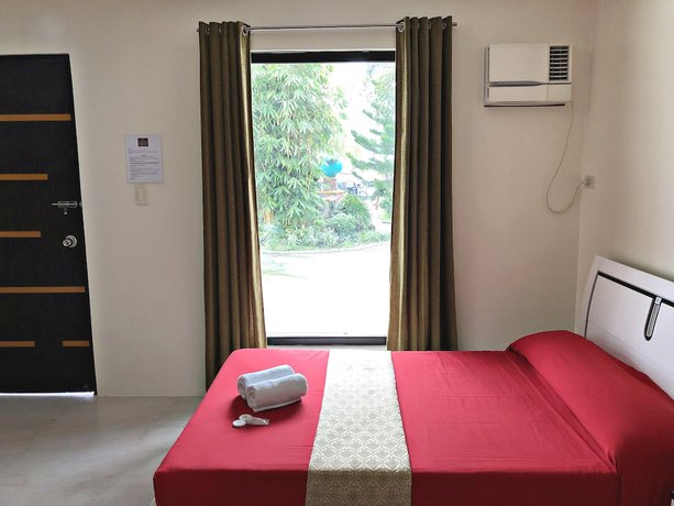 Imagen de la habitación del Hotel Quezon Premier Candelaria. Foto 5