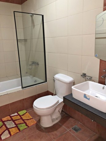 Imagen de la habitación del Hotel Quezon Premier Candelaria. Foto 12
