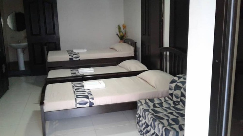Imagen de la habitación del Hotel Quezon Premier Lucena. Foto 3