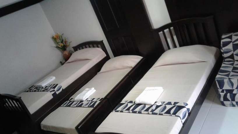 Imagen de la habitación del Hotel Quezon Premier Lucena. Foto 5