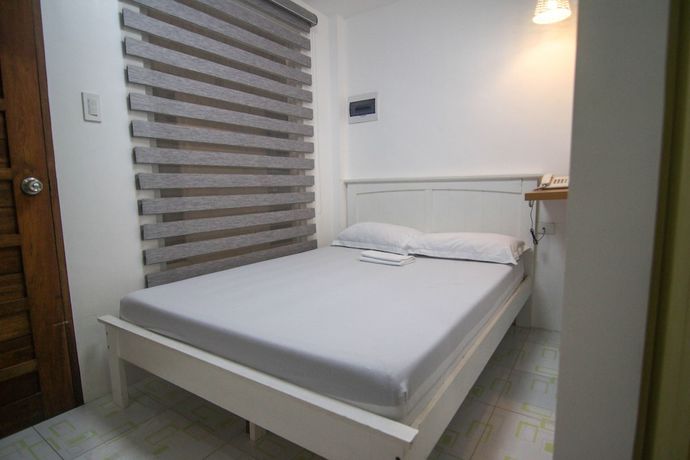 Imagen de la habitación del Hotel Quezon Premier Lucena. Foto 6