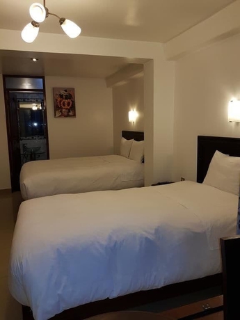 Imagen de la habitación del Hotel Quilla House. Foto 7