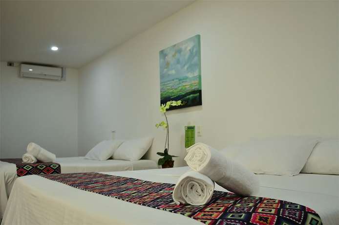 Imagen de la habitación del Hotel Quimbaya. Foto 13