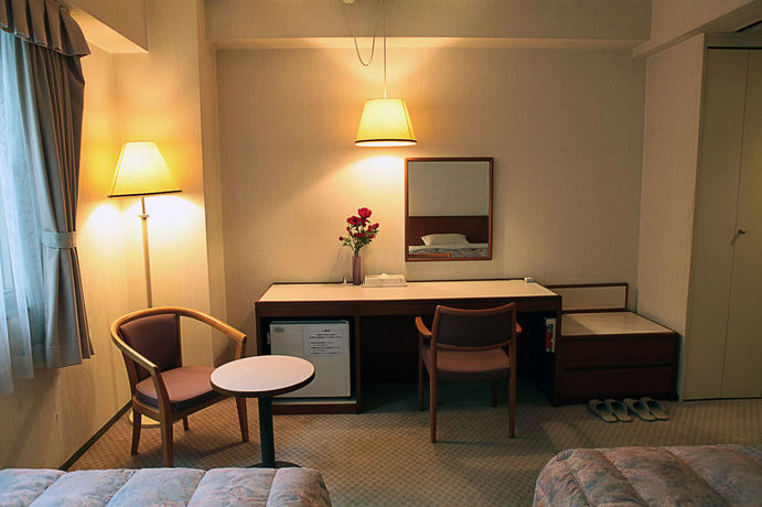 Imagen de la habitación del Hotel Quincy's Inn Toyohashi. Foto 4