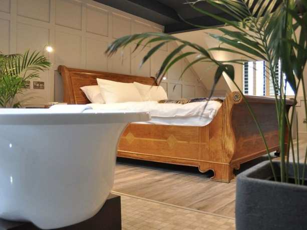 Imagen de la habitación del Hotel Quinlan and Cooke Boutique Townhouse. Foto 13