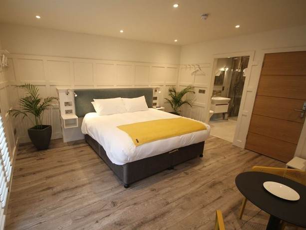 Imagen de la habitación del Hotel Quinlan and Cooke Boutique Townhouse. Foto 14