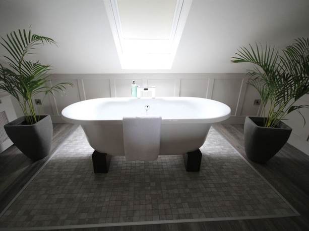 Imagen de la habitación del Hotel Quinlan and Cooke Boutique Townhouse. Foto 18