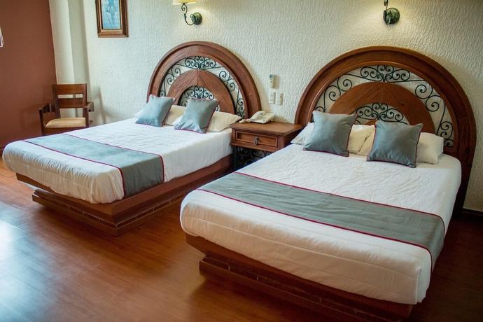 Imagen de la habitación del Hotel Quinta Antigua. Foto 9