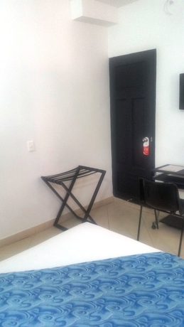 Imagen de la habitación del Hotel Quinta Avenida, MEDELLIN. Foto 7