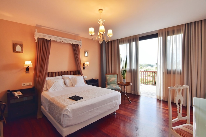 Imagen de la habitación del Hotel Quinta De San Amaro. Foto 13