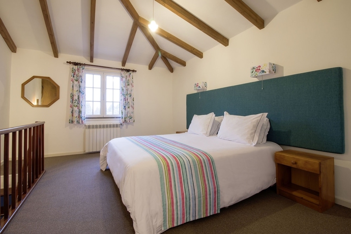 Imagen de la habitación del Hotel Quinta De Santo António Da Serra. Foto 13