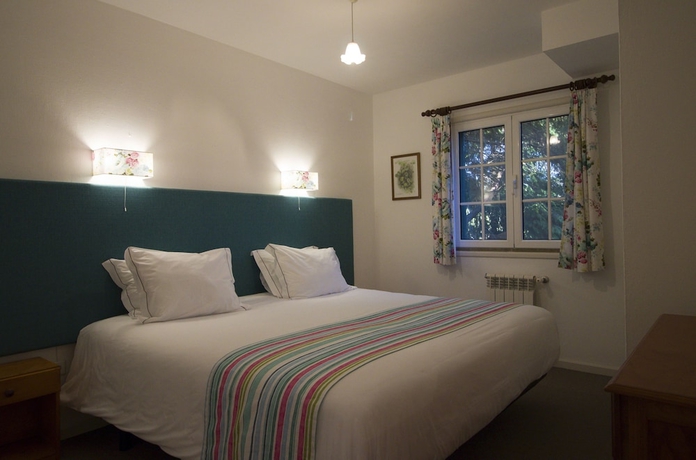 Imagen de la habitación del Hotel Quinta De Santo António Da Serra. Foto 14