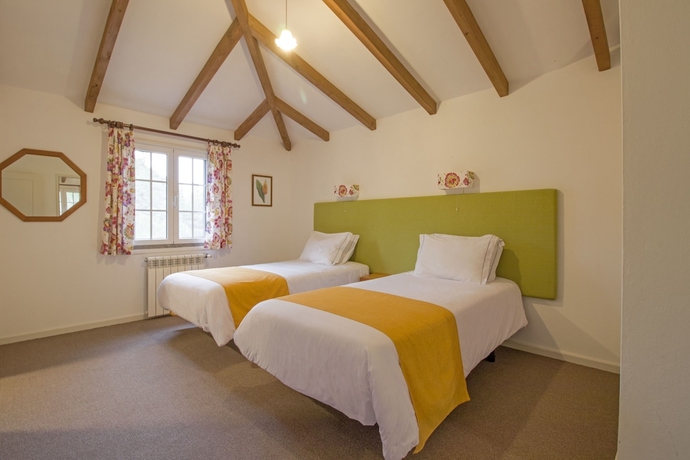 Imagen de la habitación del Hotel Quinta De Santo António Da Serra. Foto 16