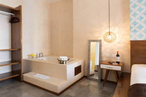 Imagen de la habitación del Hotel Quinta Margarita, Boho Chic. Foto 5