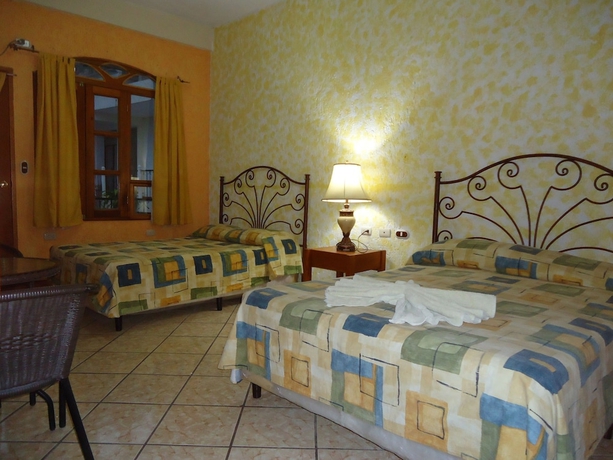 Imagen de la habitación del Hotel Quinta Maya. Foto 14
