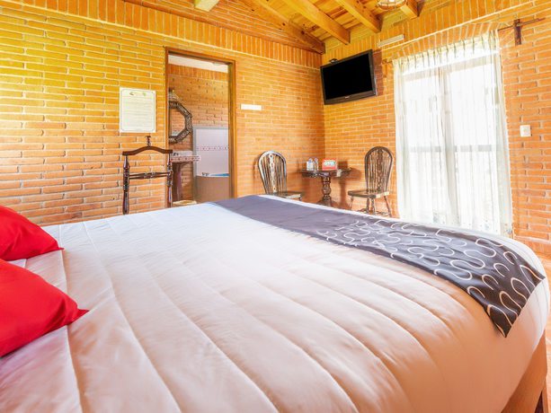 Imagen de la habitación del Hotel Quinta Mirador Zacualli. Foto 9