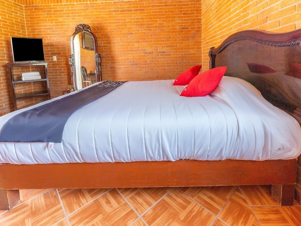 Imagen de la habitación del Hotel Quinta Mirador Zacualli. Foto 16