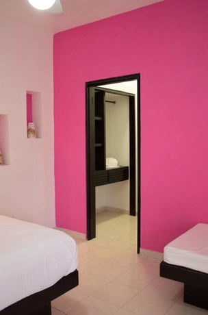 Imagen de la habitación del Hotel Quinta Moctezuma. Foto 16