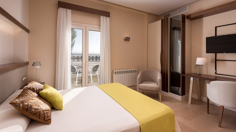 Imagen de la habitación del Hotel Quinta Real Granada. Foto 7