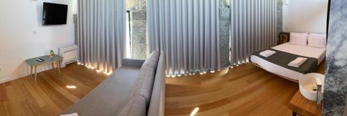 Imagen de la habitación del Hotel Quinta da Tulha By VimaHotels. Foto 11