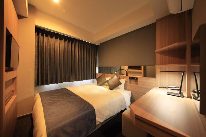 Imagen de la habitación del Hotel Quintessa Hotel Osaka Shinsaibashi Comic and Books. Foto 5