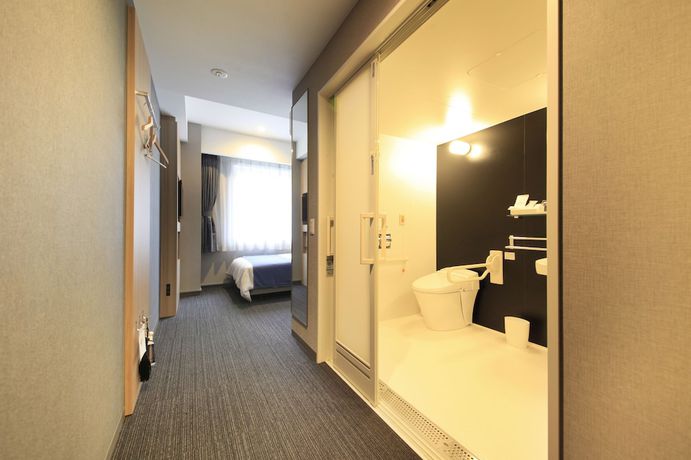 Imagen de la habitación del Hotel Quintessa Hotel Osaka Shinsaibashi Comic and Books. Foto 11