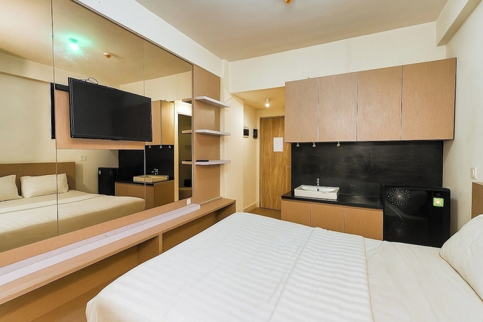 Imagen de la habitación del Hotel Quintessa Room at Candiland Apartement. Foto 2