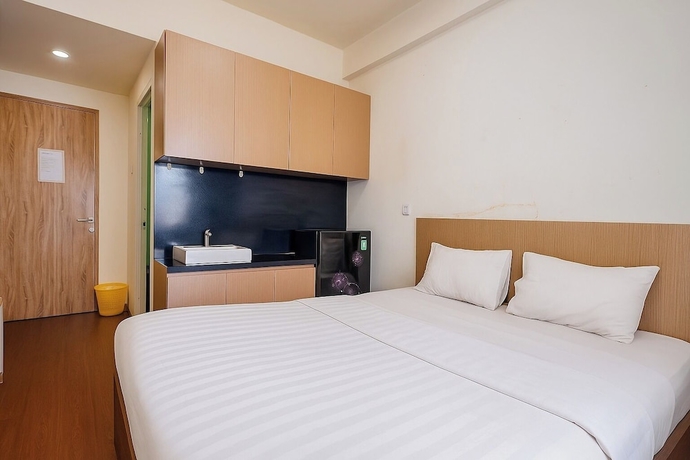 Imagen de la habitación del Hotel Quintessa Room at Candiland Apartement. Foto 3