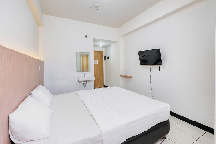 Imagen de la habitación del Hotel Quintessa Room at Candiland Apartement. Foto 4