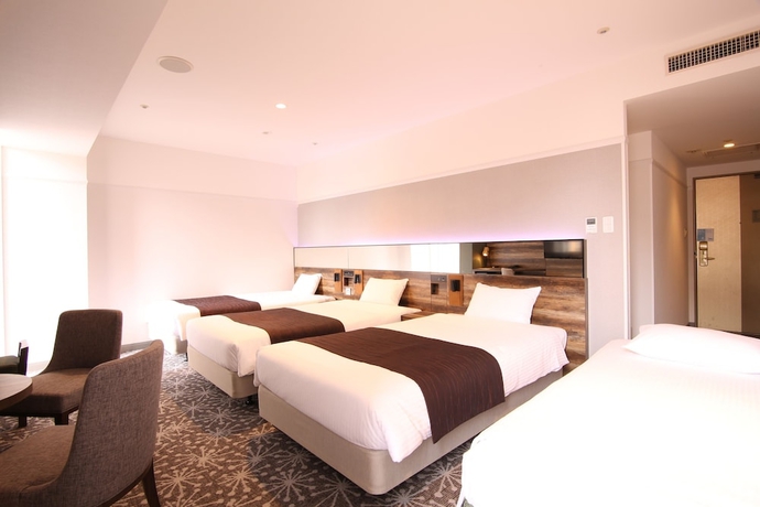 Imagen de la habitación del Hotel Quintessa Sapporo. Foto 8