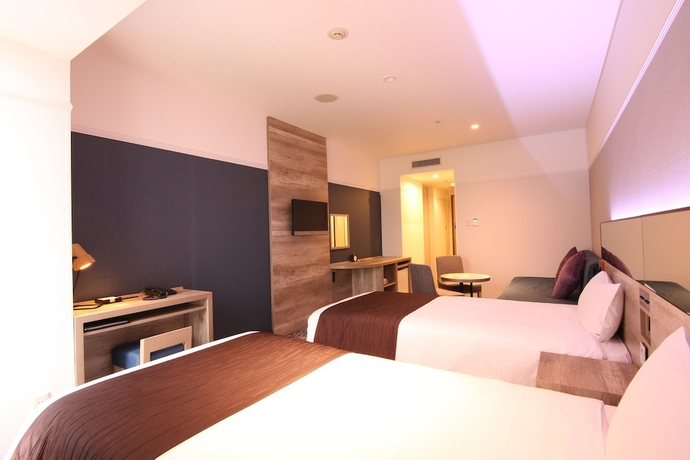 Imagen de la habitación del Hotel Quintessa Sapporo. Foto 14