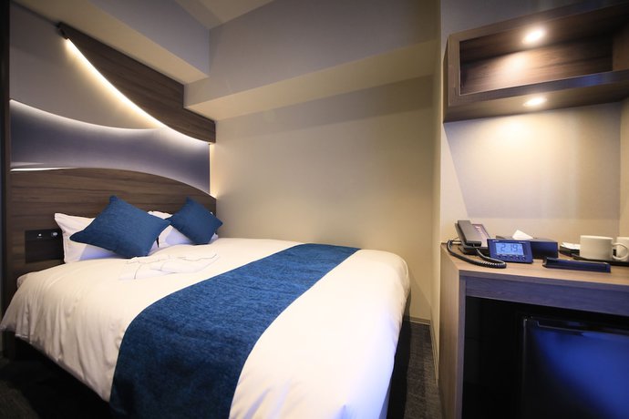 Imagen de la habitación del Hotel Quintessa Tokyo Ginza. Foto 17