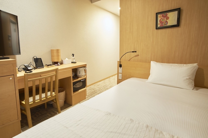 Imagen de la habitación del Hotel Quintessa Tokyo Haneda Comic & Books. Foto 2