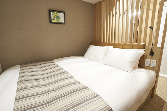 Imagen de la habitación del Hotel Quintessa Tokyo Haneda Comic & Books. Foto 4