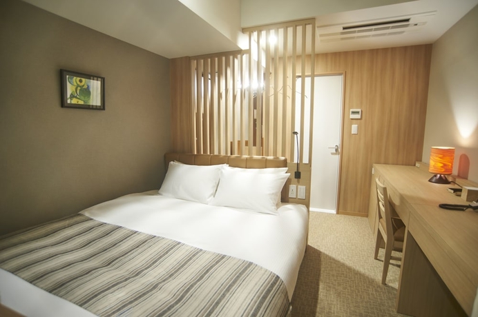 Imagen de la habitación del Hotel Quintessa Tokyo Haneda Comic & Books. Foto 5