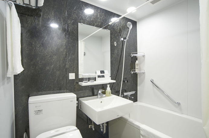 Imagen de la habitación del Hotel Quintessa Tokyo Haneda Comic & Books. Foto 7