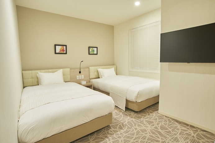 Imagen de la habitación del Hotel Quintessa Tokyo Haneda Comic & Books. Foto 10