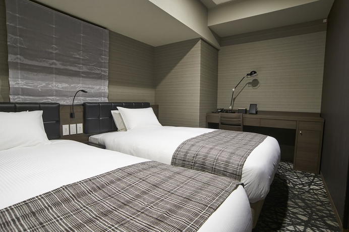 Imagen de la habitación del Hotel Quintessa Tokyo Haneda Comic & Books. Foto 11
