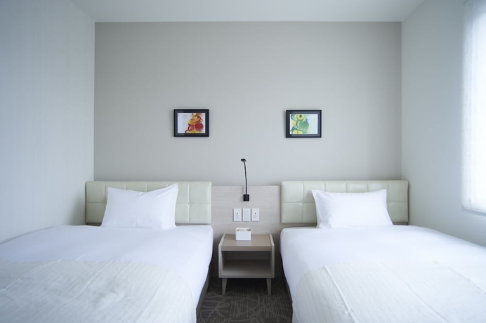 Imagen de la habitación del Hotel Quintessa Tokyo Haneda Comic & Books. Foto 14