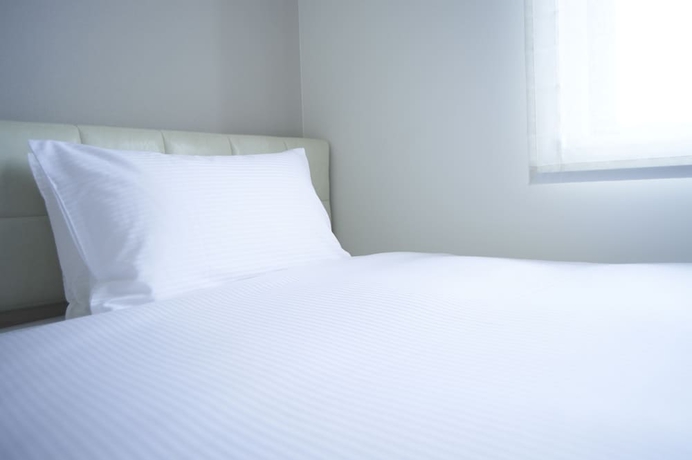 Imagen de la habitación del Hotel Quintessa Tokyo Haneda Comic & Books. Foto 15